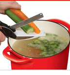 Affettaverdure 2 in 1 con tagliere integrato