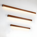 Applique lineare in legno con luce sottile