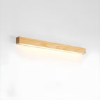 Applique lineare in legno con luce sottile