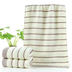 Asciugamano in cotone con eleganti righe