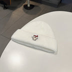 Berretto a maglia con ricamo