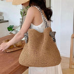 Borsa a mano con tracolle a righe