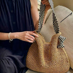 Borsa a mano con tracolle a righe