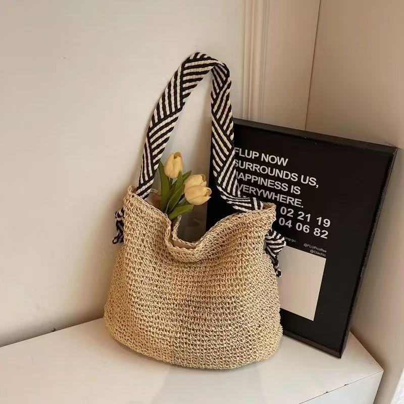 Borsa a mano con tracolle a righe