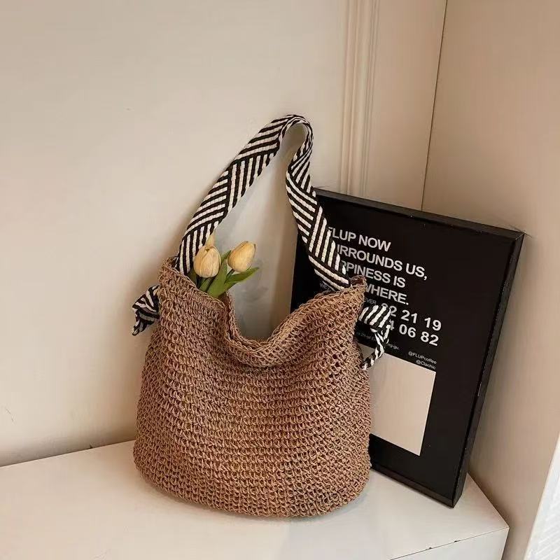 Borsa a mano con tracolle a righe