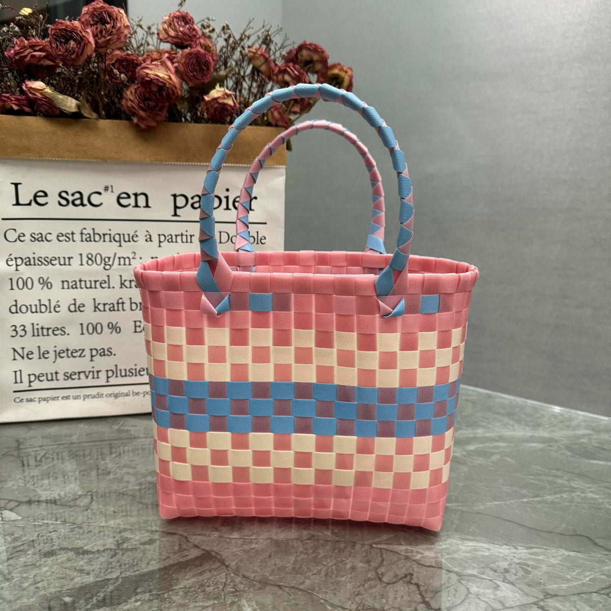 Borsa a mano giocosa con fiore e fiocco