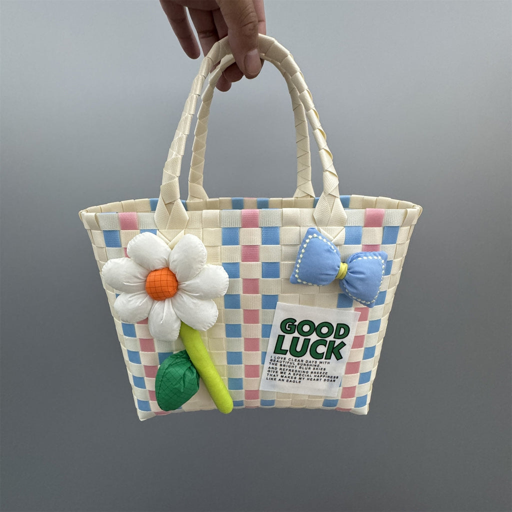 Borsa a mano giocosa con fiore e fiocco
