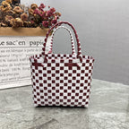 Borsa a mano giocosa con fiore e fiocco