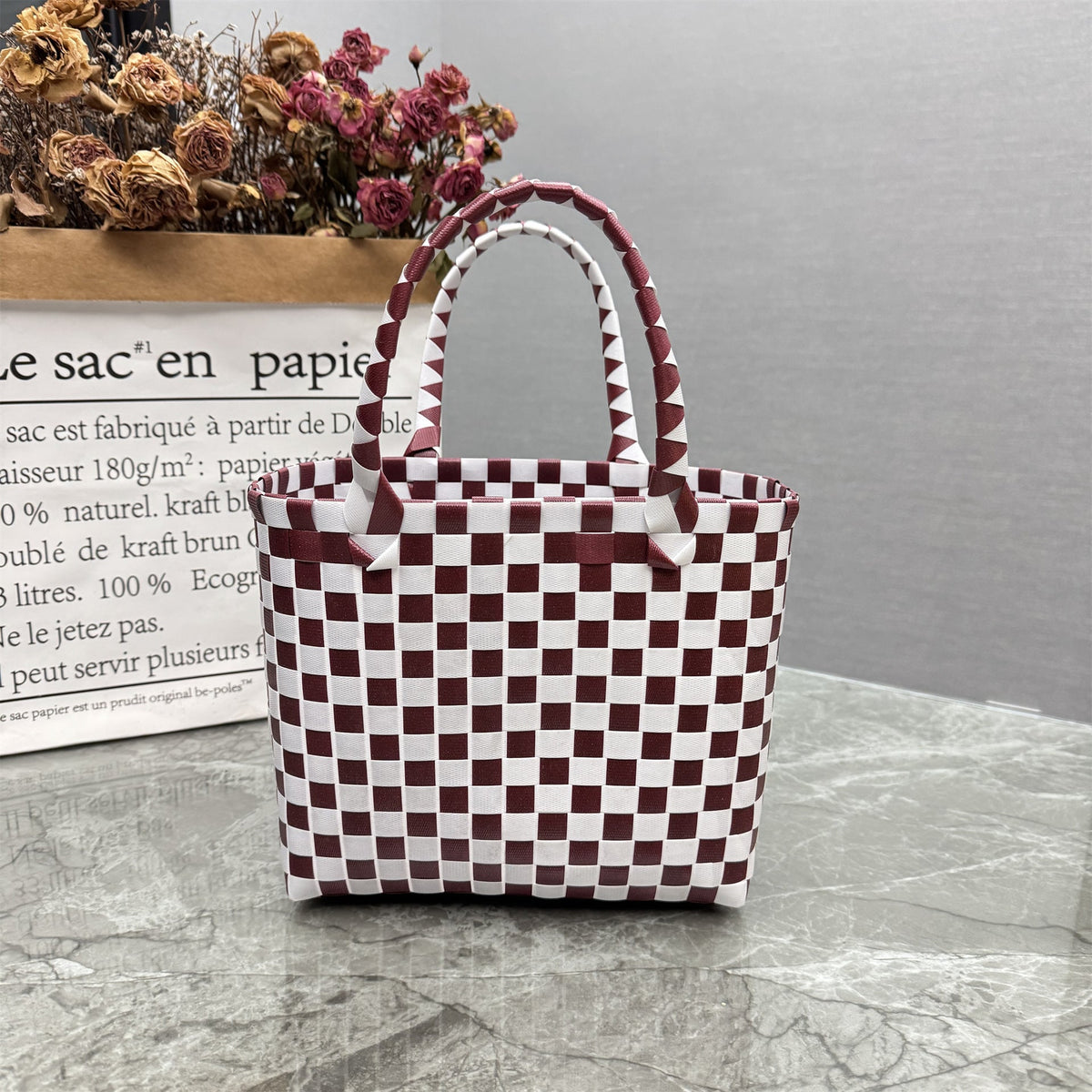 Borsa a mano giocosa con fiore e fiocco