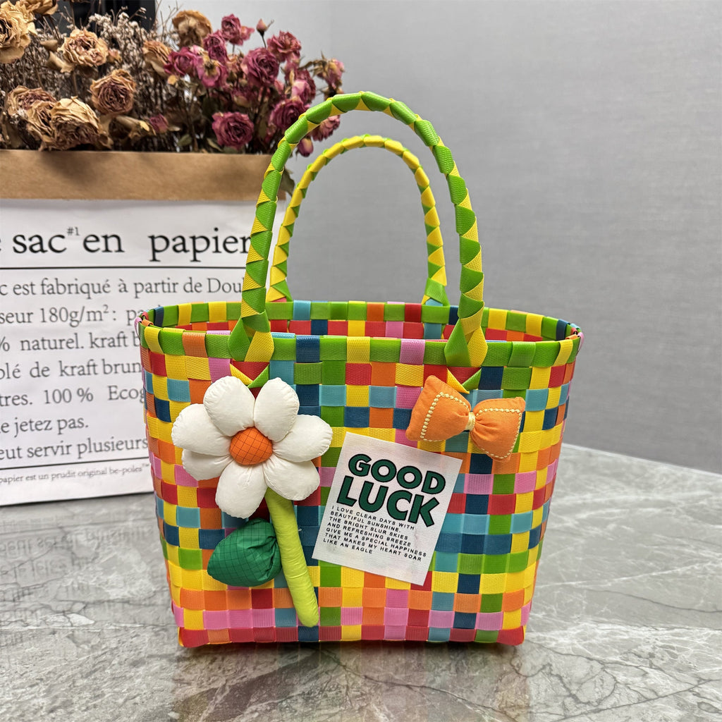 Borsa a mano giocosa con fiore e fiocco