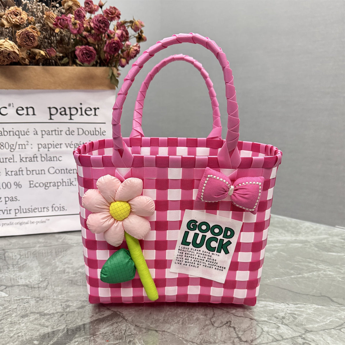 Borsa a mano giocosa con fiore e fiocco