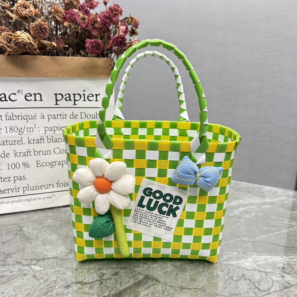Borsa a mano giocosa con fiore e fiocco