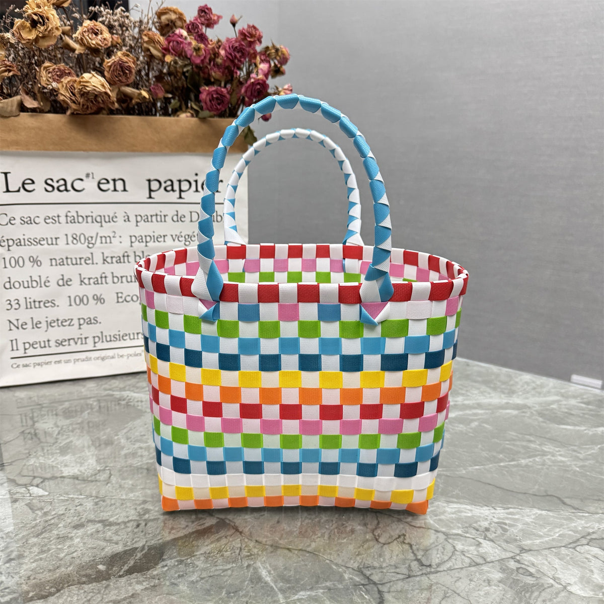 Borsa a mano giocosa con fiore e fiocco