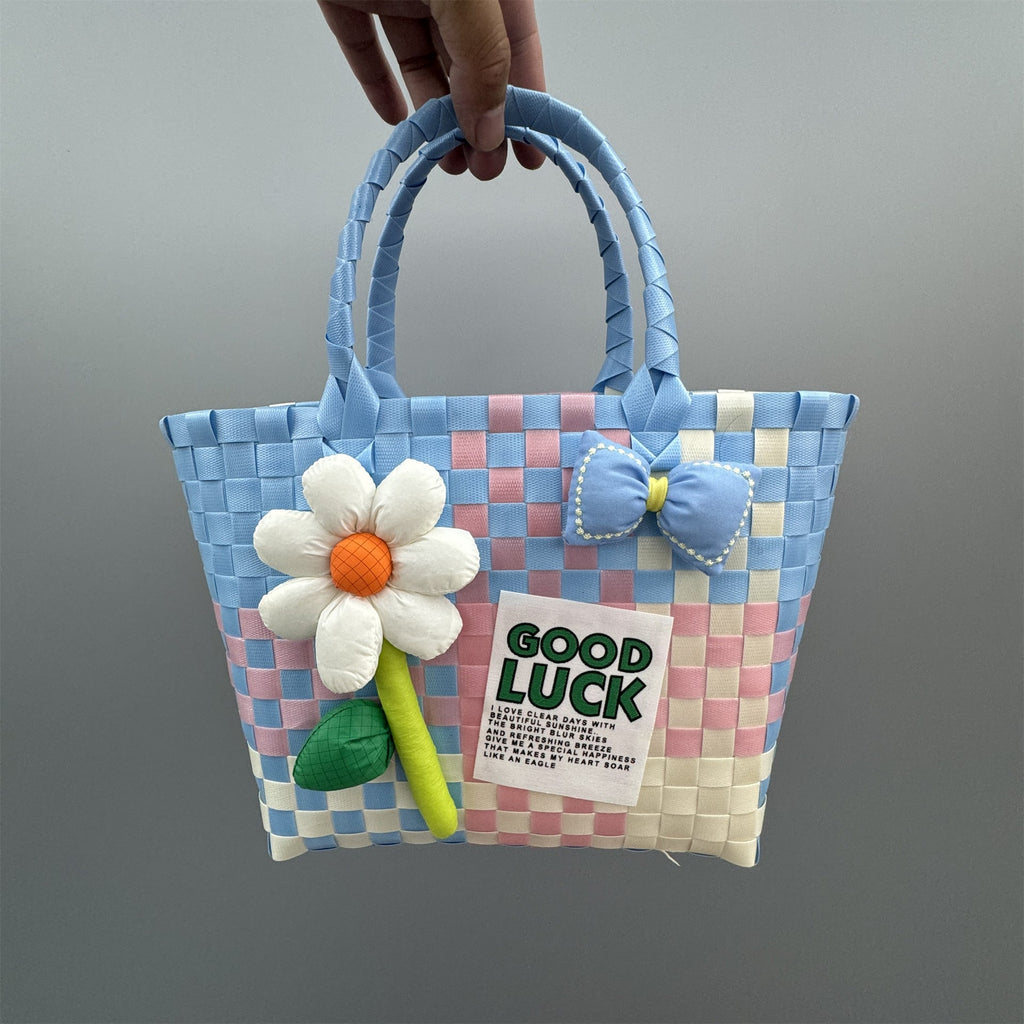 Borsa a mano giocosa con fiore e fiocco