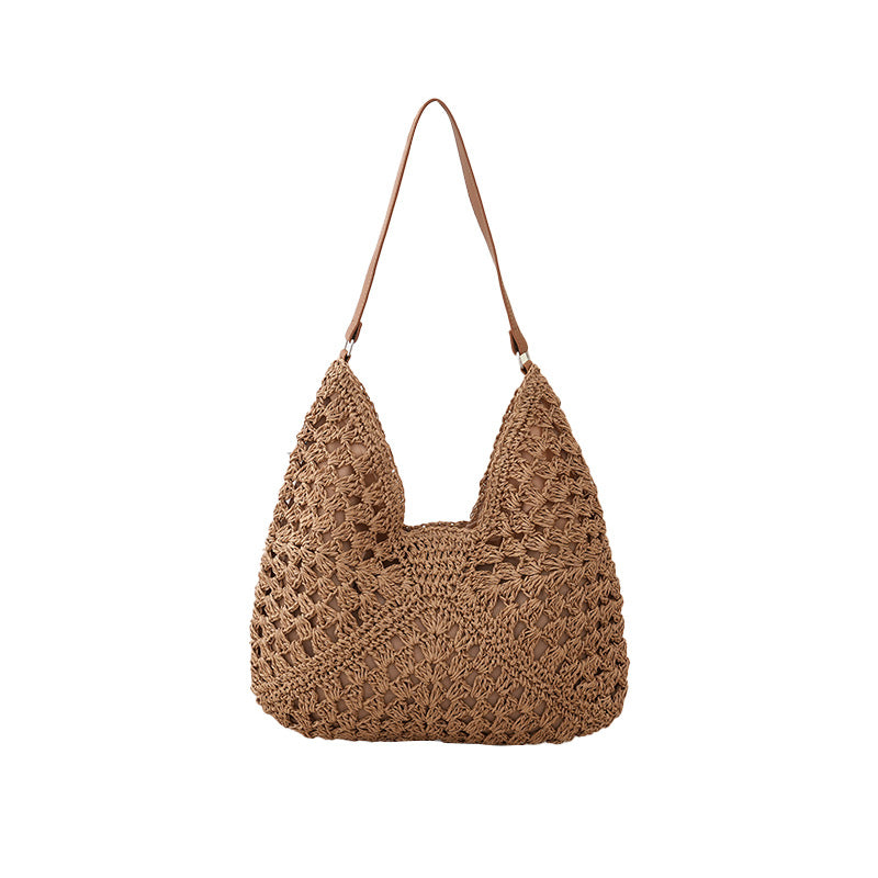 Borsa a spalla artigianale in materiali naturali