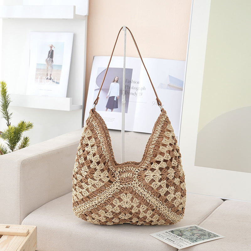 Borsa a spalla artigianale in materiali naturali