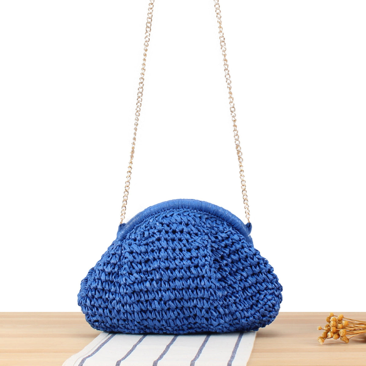 Borsa a spalla in fibre naturali intrecciate a mano con catena decorativa