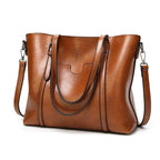 Borsa a tracolla capiente in similpelle