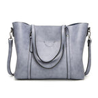 Borsa a tracolla capiente in similpelle