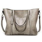 Borsa a tracolla capiente in similpelle
