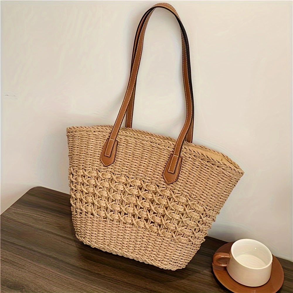 Borsa intrecciata con manici in pelle