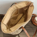 Borsa intrecciata con manici in pelle