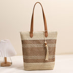 Borsa tote intrecciata in materiali naturali