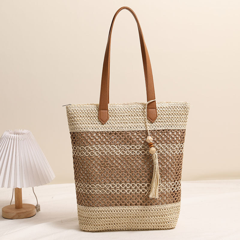 Borsa tote intrecciata in materiali naturali