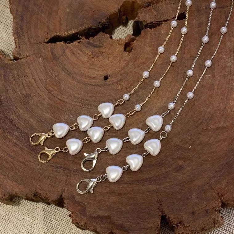 Bracciale con perle a forma di cuore