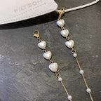 Bracciale con perle a forma di cuore