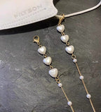 Bracciale con perle a forma di cuore