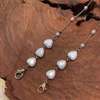 Bracciale con perle a forma di cuore