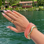 Bracciale dorato arancione – Un tocco di stile per look moderni