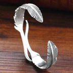 Bracciale regolabile con piume argentate