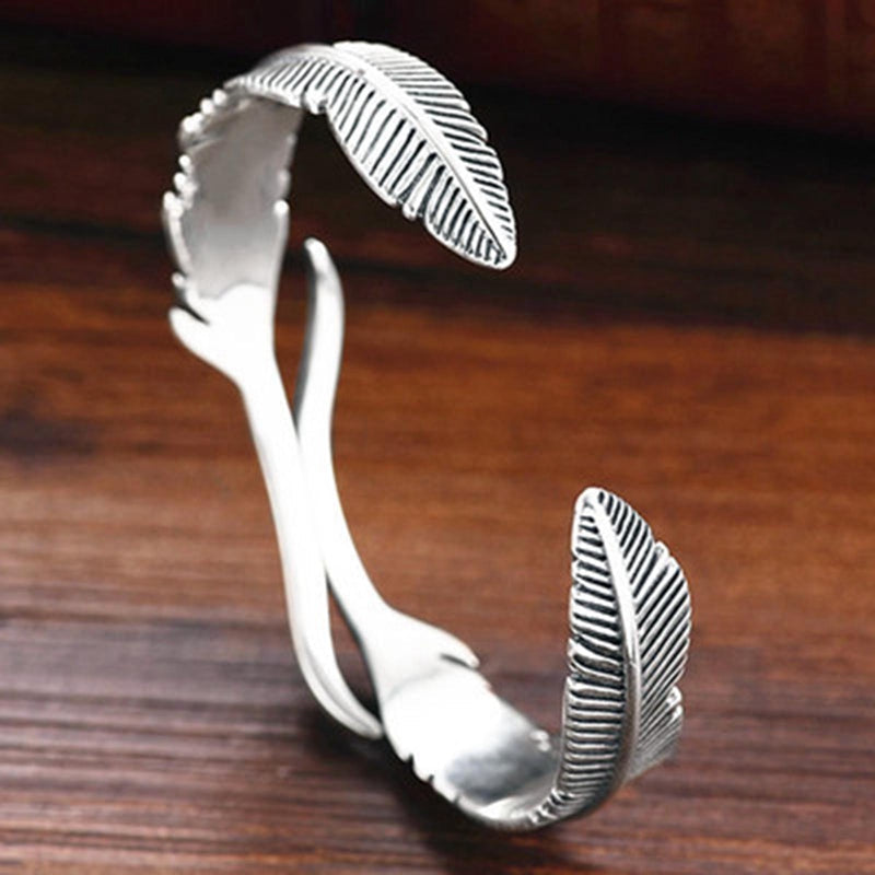 Bracciale regolabile con piume argentate
