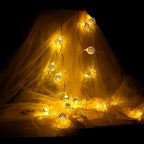 Catena luminosa LED con sfere dorate decorative