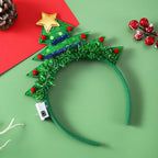 Cerchietto natalizio luminoso con luci LED – albero, fiocco di neve, corna di renna