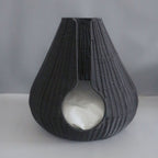 Cesto portaoggetti in rattan dal design elegante