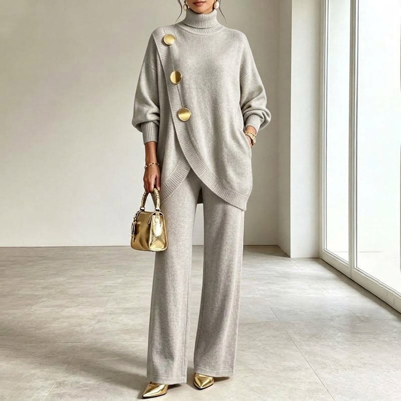 Completo in maglia due pezzi con top asimmetrico a bottoni e pantaloni a gamba larga