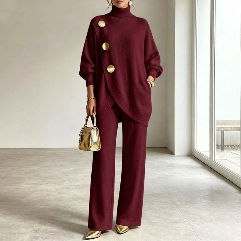 Completo in maglia due pezzi con top asimmetrico a bottoni e pantaloni a gamba larga