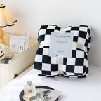 Coperta a quadri morbida e moderna per casa