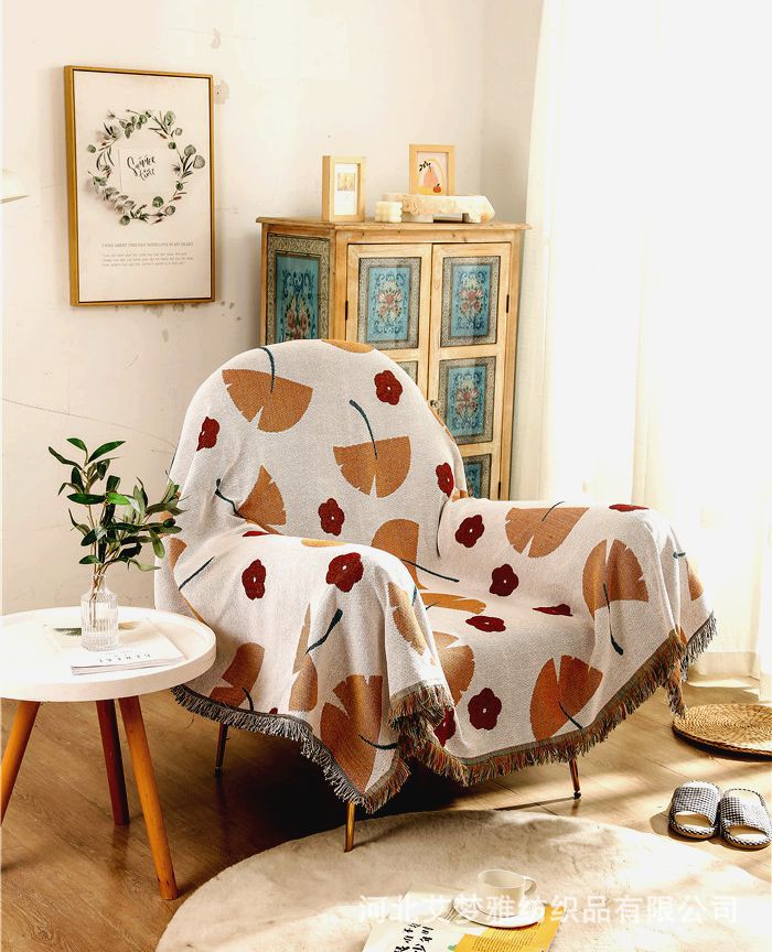 Coperta decorativa in tessuto morbido con motivo geometrico