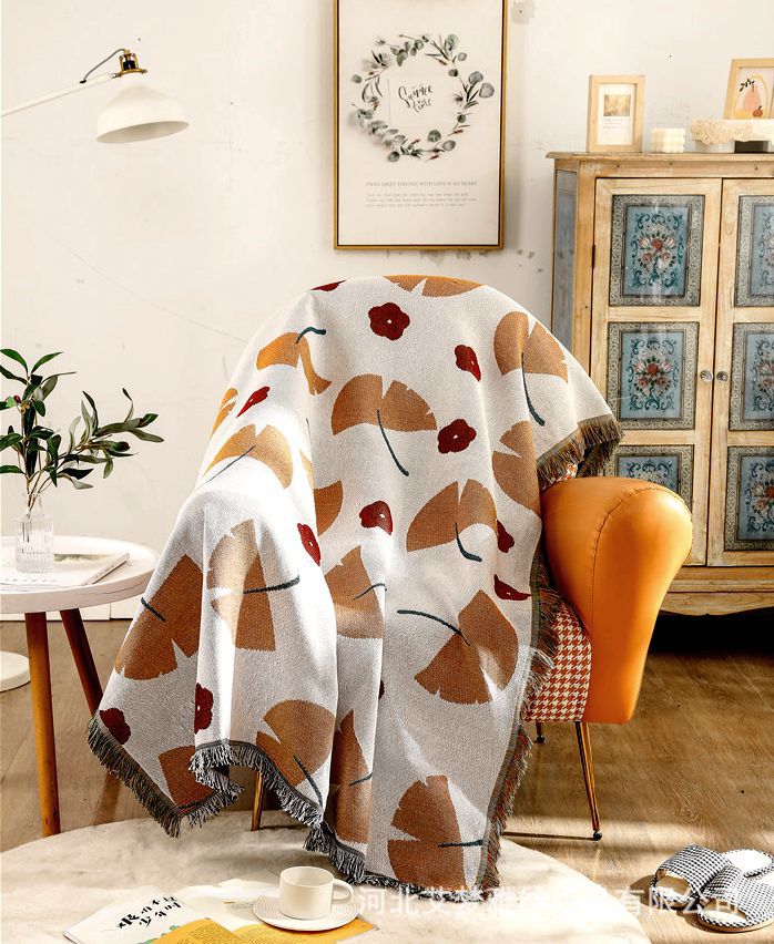 Coperta decorativa in tessuto morbido con motivo geometrico
