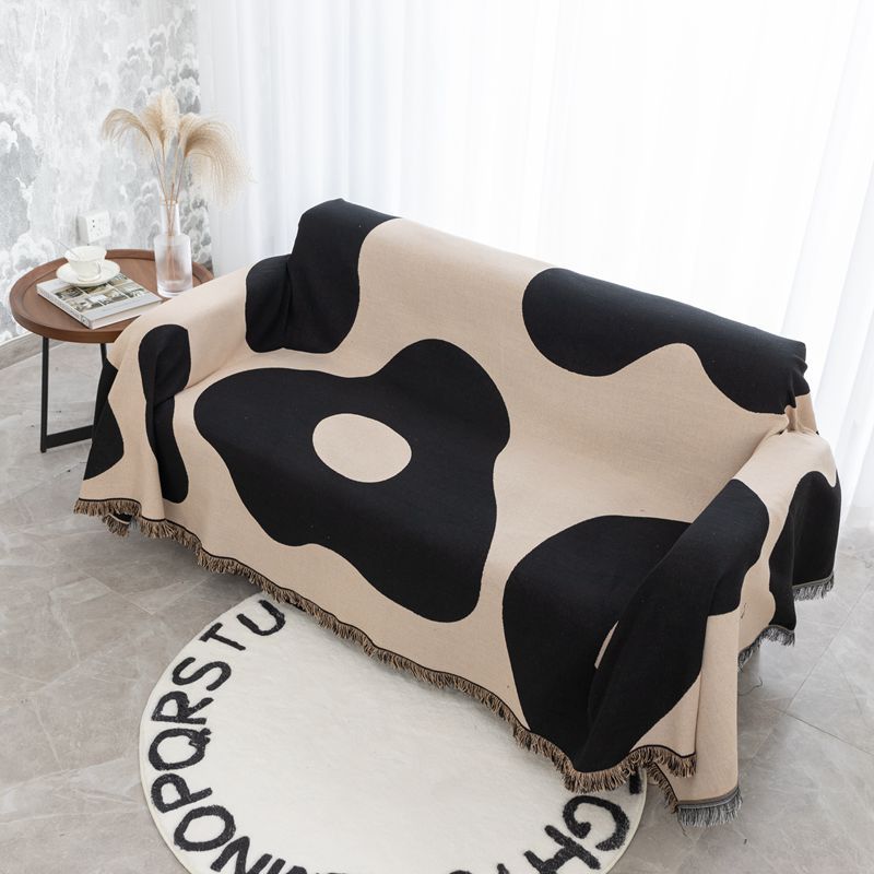 Coperta decorativa in tessuto morbido con motivo geometrico