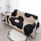 Coperta decorativa in tessuto morbido con motivo geometrico
