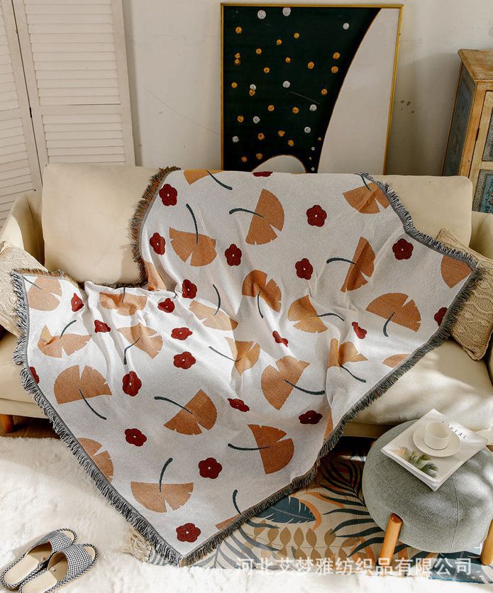 Coperta decorativa in tessuto morbido con motivo geometrico