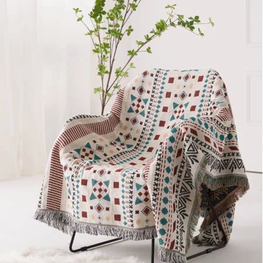 Coperta decorativa in tessuto morbido con motivo geometrico
