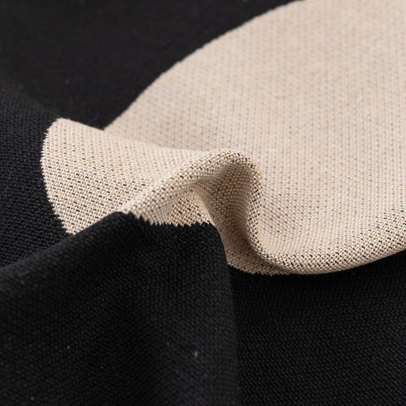 Coperta decorativa in tessuto morbido con motivo geometrico