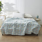 Coperta elegante con delicato motivo a foglie