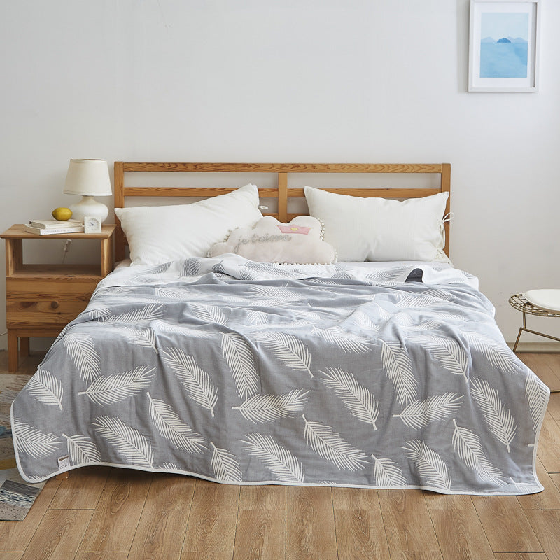Coperta elegante con delicato motivo a foglie